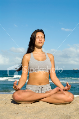 ist2_5546601-mediation-on-the-beach-yoga-lotus-position